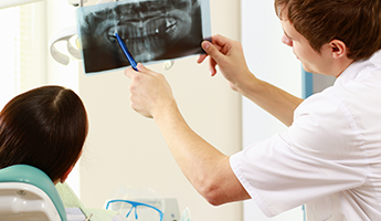 Dentist Reviewing an X-Ray